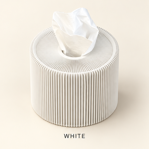 Round white ribbed tissue box cover with a tissue coming out of the top opening