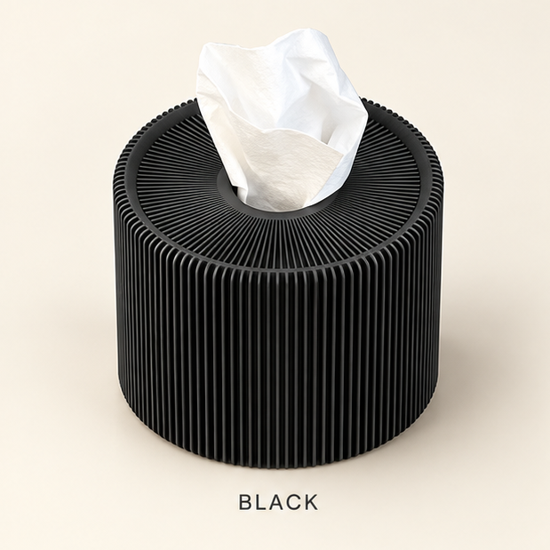 Round black ribbed tissue box cover with a tissue coming out of the top opening