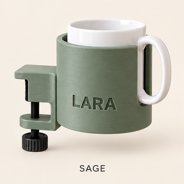 Sage green clamp-on cup holder engraved LARA, holding a white mug