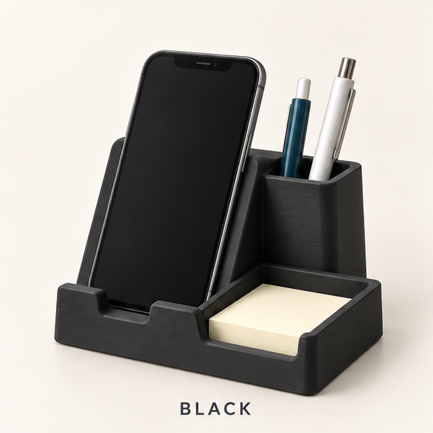 Black phone stand holding a smartphone, with a pen cup and sticky-note tray