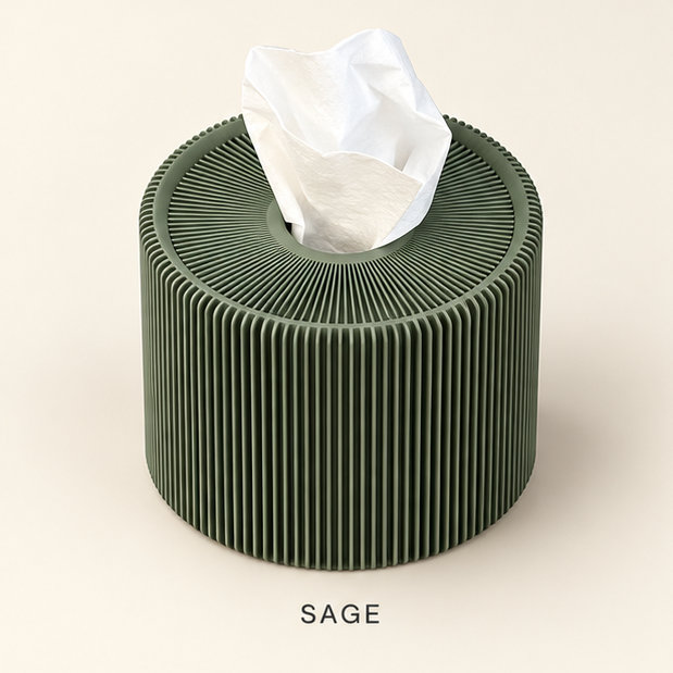 Round sage green ribbed tissue box cover with a tissue coming out of the top opening