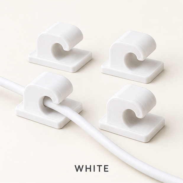 Four white cable clips, two holding a white charging cable