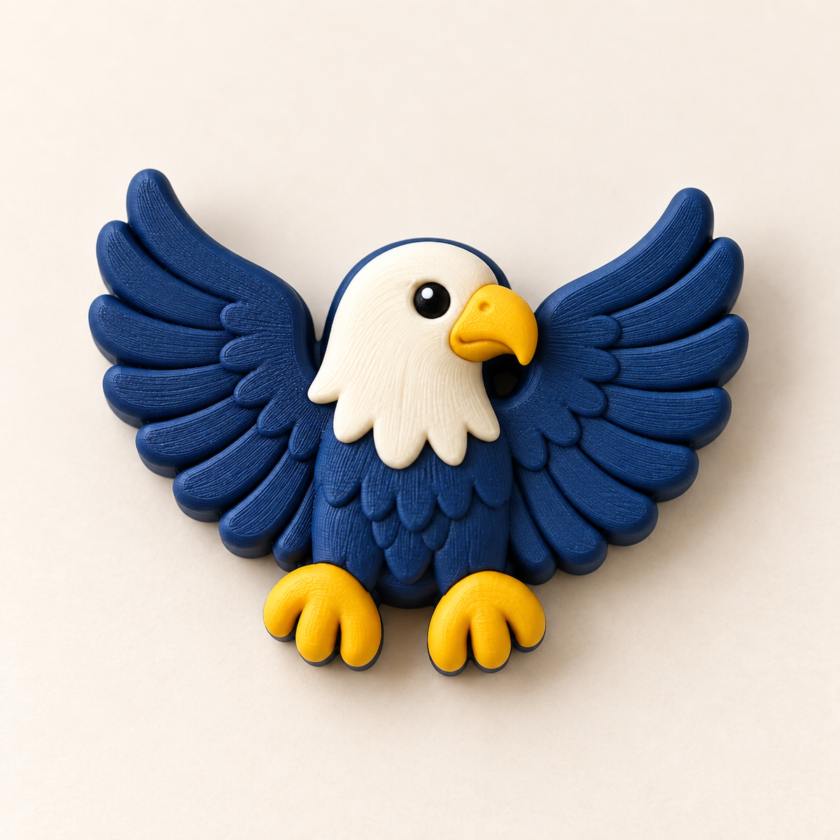 Bald eagle charm with spread navy wings