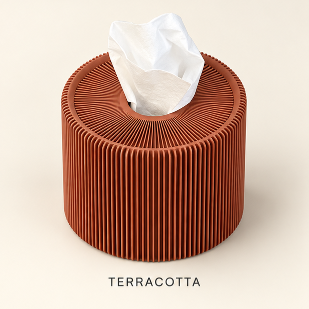 Round terracotta ribbed tissue box cover with a tissue coming out of the top opening