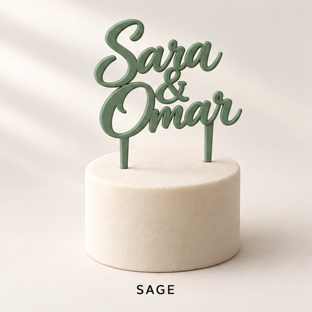 Sage green script cake topper reading Sara & Omar on a small white cake