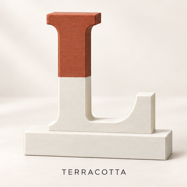Letter L monogram stand split terracotta over cream, on a flat base