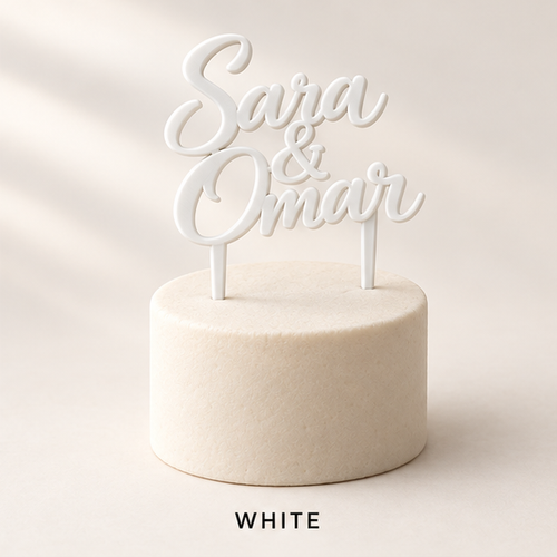 White script cake topper reading Sara & Omar on a small white cake