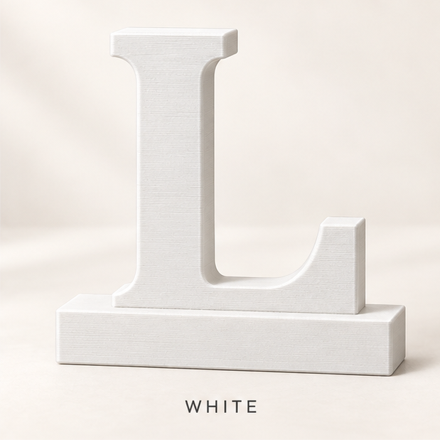 White letter L monogram stand on a flat base
