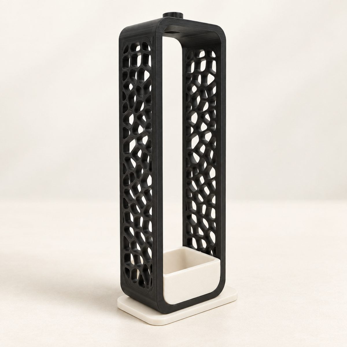 Tall black incense holder with a voronoi lattice pattern and a white ash tray