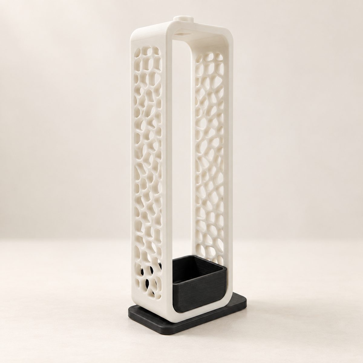 Tall white incense holder with a voronoi lattice pattern and a black ash tray